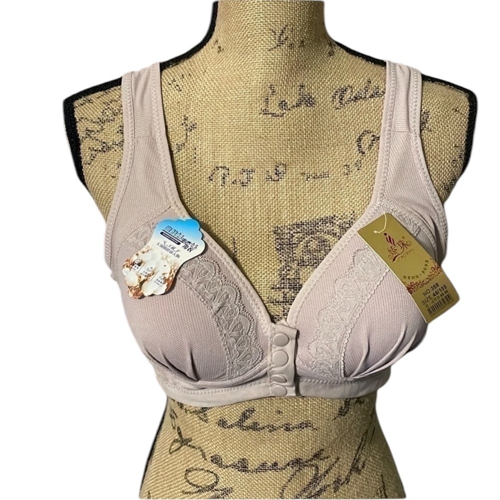 Beautiful lavender lace bra with snap front buttons. NWT.